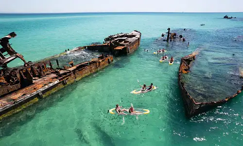 1 Day Moreton Island Get Wrecked Snorkel, Sand Dune Surfing & 4WD Tour | Brisbane or Gold Coast